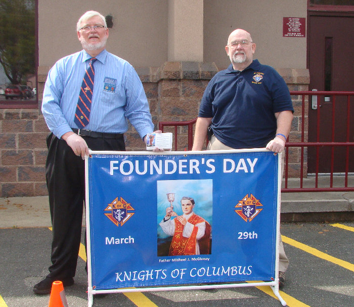 Grand Knight Eddie Williams, Knight Bryan Clark during Founder's Day event